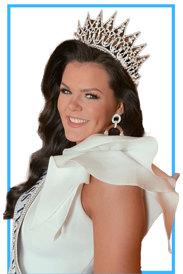 female pageant coach wearing a pageant crown